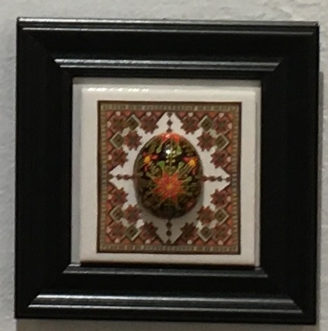 Red pysanky with mandala tile   