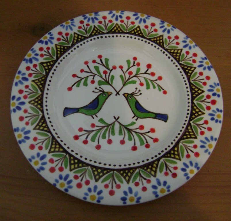 Bird with blue flowers