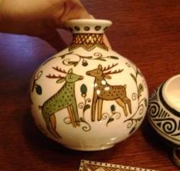 Small vase with deer   