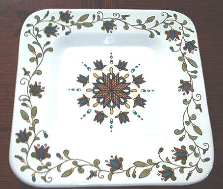 Floral plate with teal colors   